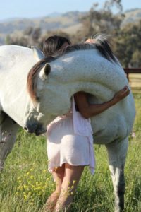 Horse Hugs Girl